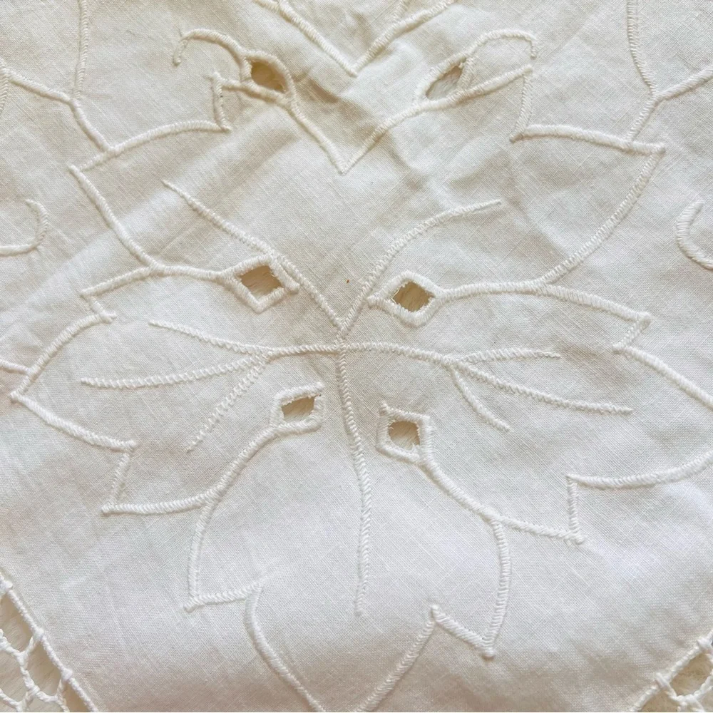 Vintage Cream Square Tablecloth with embroidered detailing, made of linen .